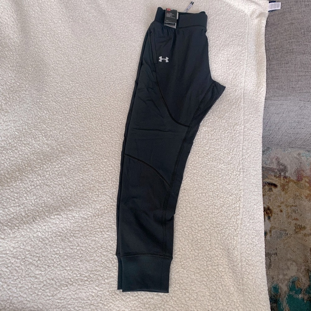 Women’s Under Armour Heat Gear running tights, blk, w/Speedpocket. Medium